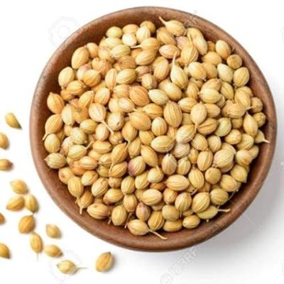 Coriander Seeds (Dhania), distinguished by their plump, brown appearance and hollow cavity bearing essential oils,
