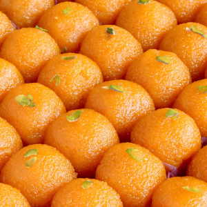 Motichoor laddu, also known as "motichoor," translating to "crushed pearls,"a ubiquitous treat in Indian festivals,